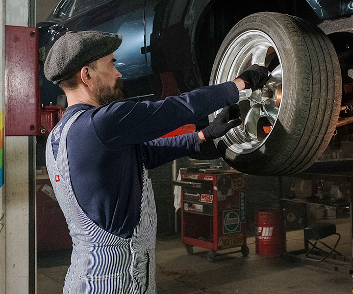 Mechanic Changing a Wheel 2